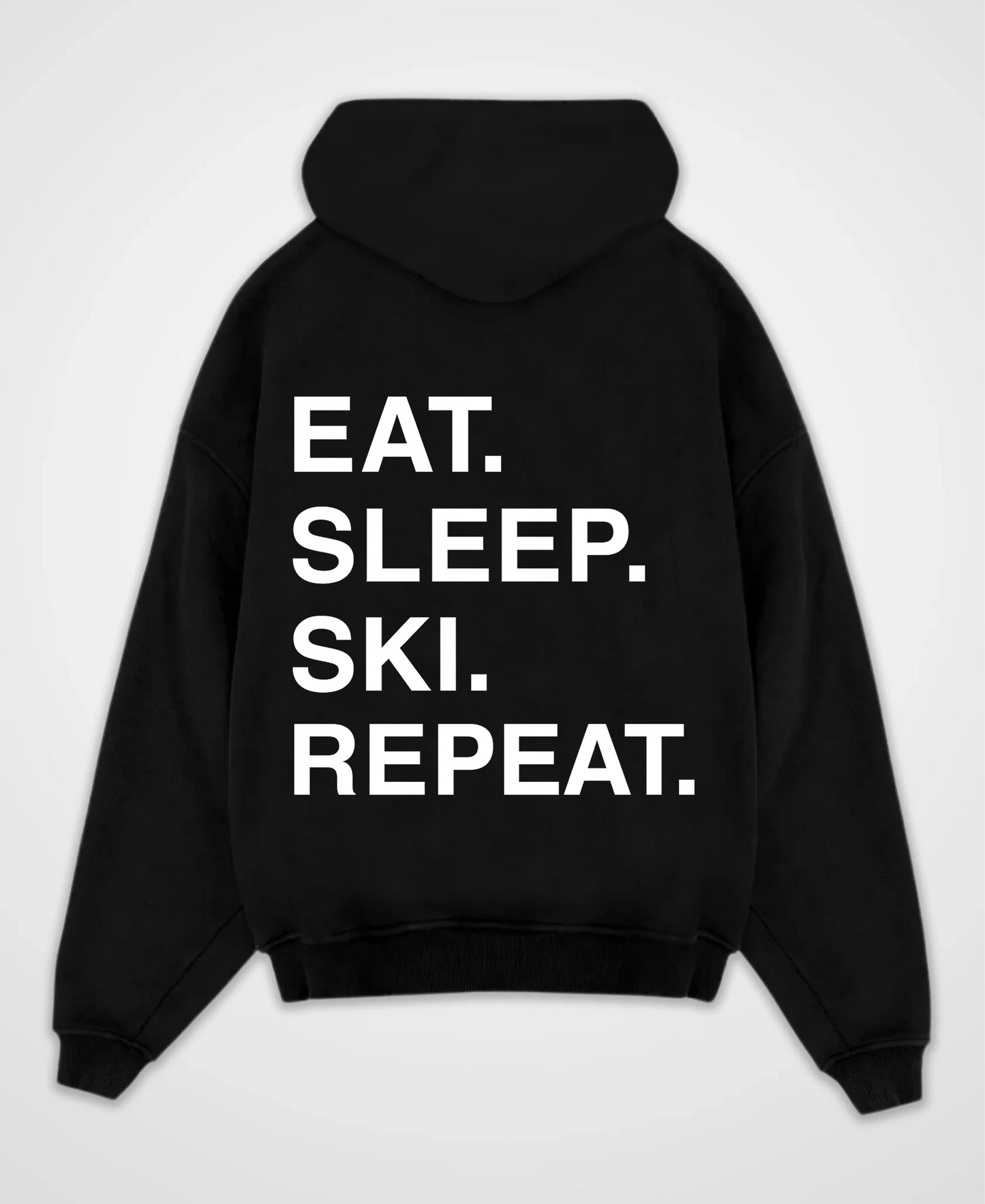 EAT. SLEEP. SKI. REPEAT. OVERSIZED HOODIE